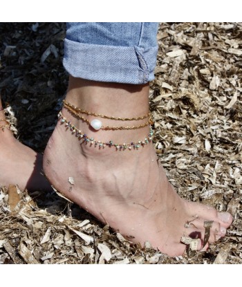 Bracelet de cheville doré et perle de culture Dans la société mordern