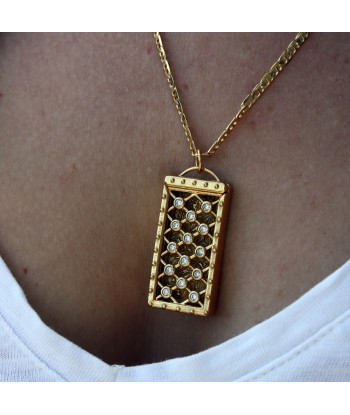 Collier doré cage et zircons suggérées chez