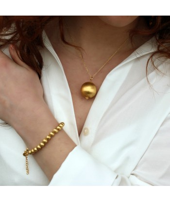 Collier doré et boule brossée En savoir plus